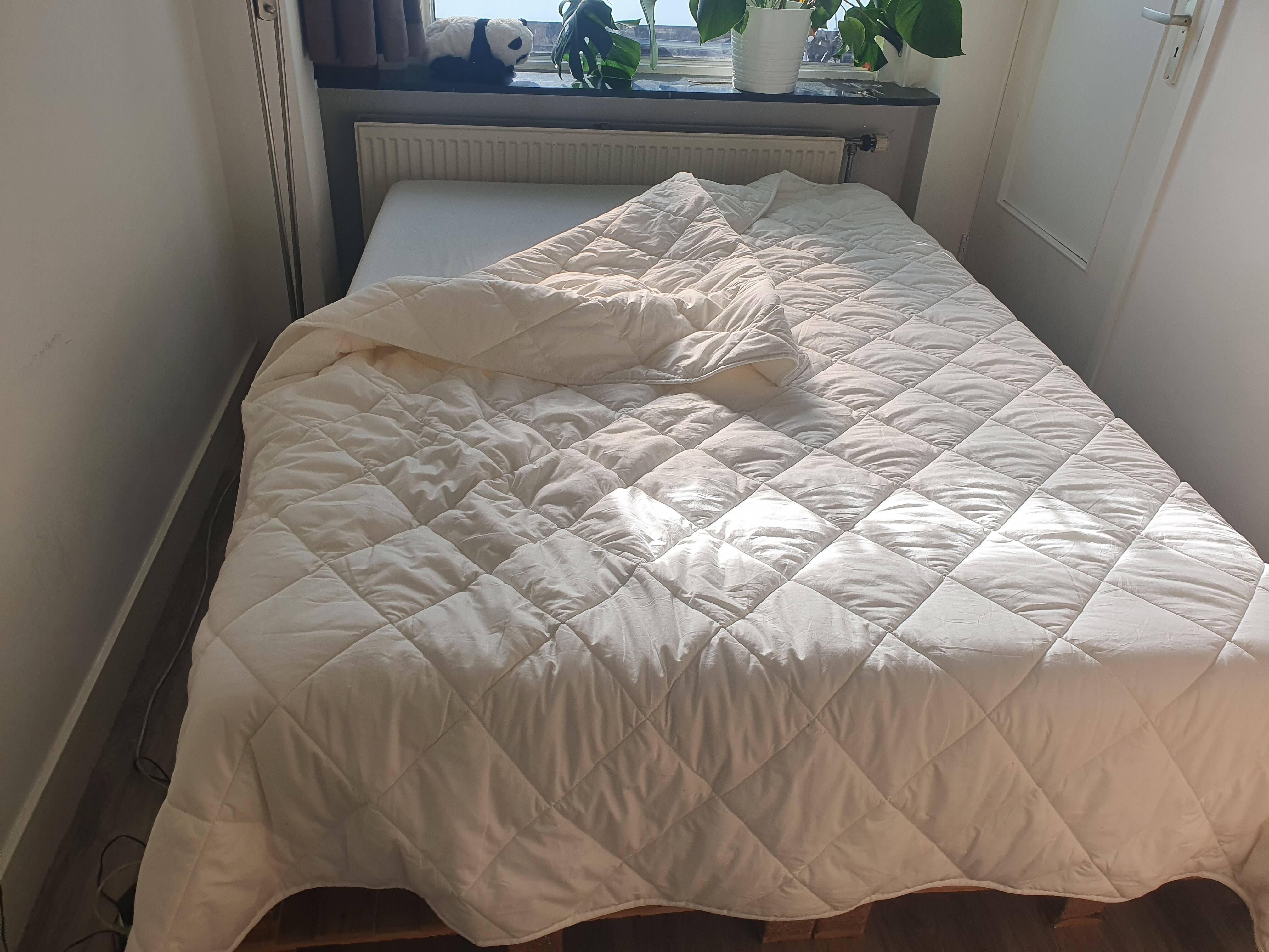 Kipli dekbed uitgespreid